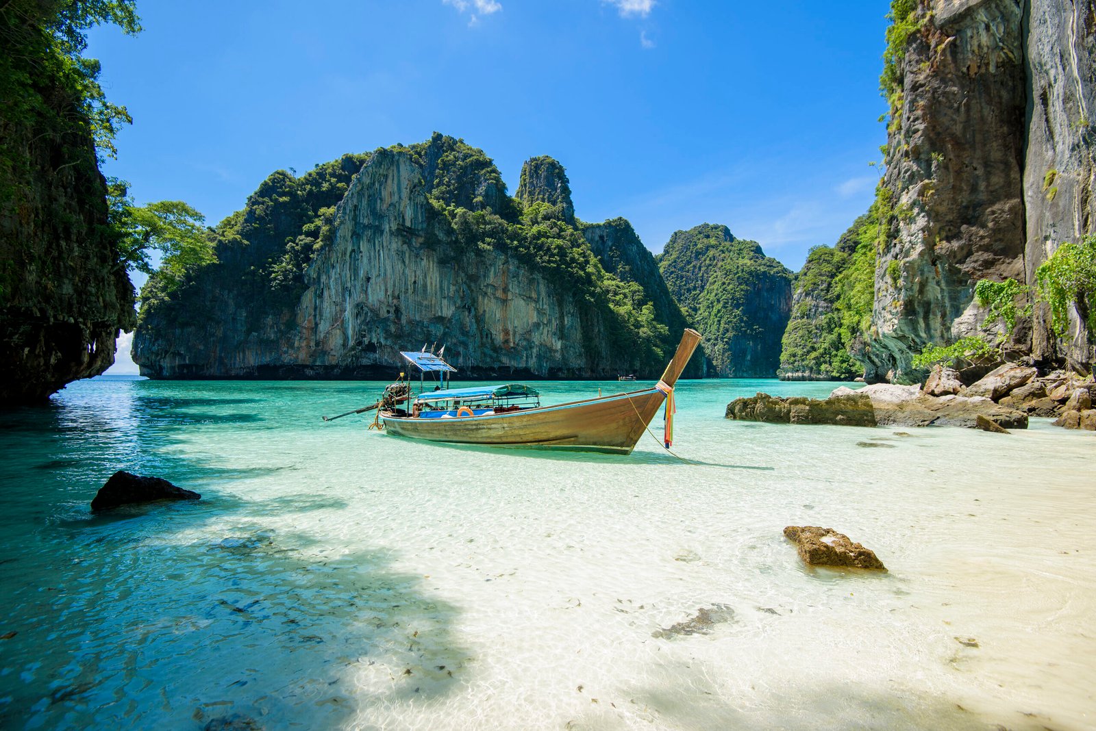 View of thai traditional longtail Boat over clear sea and sky in the sunny day, Phi phi Islands, Thailand
